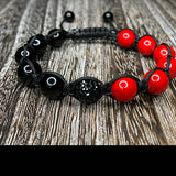 Men's red fossil and black onyx braided cord bracelet with black rhinestone center bead